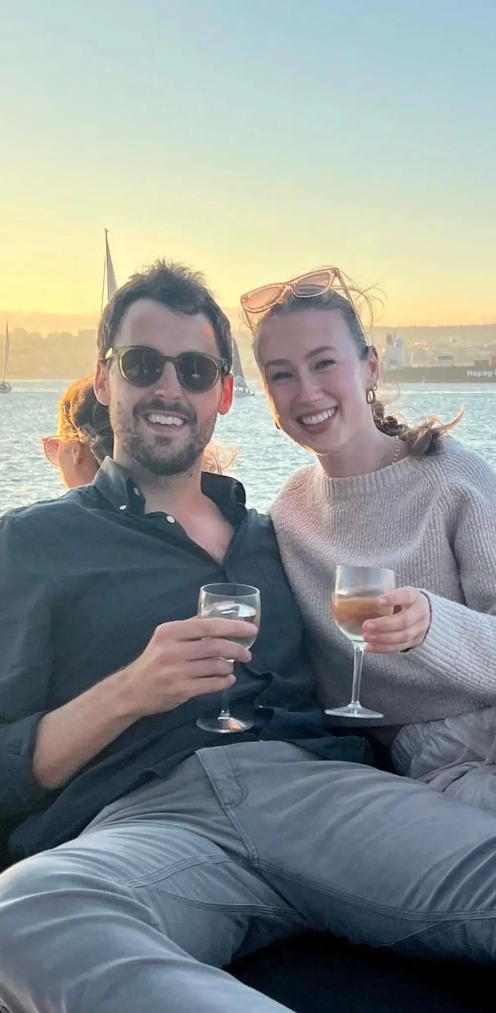 Stuart and Kirsty with wine at sunset